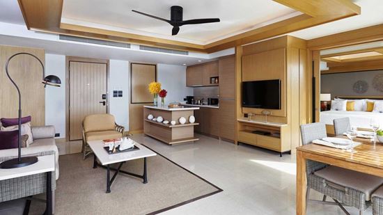Separate living and dining room in Two Bedroom Suite Ocean Coral Lounge
